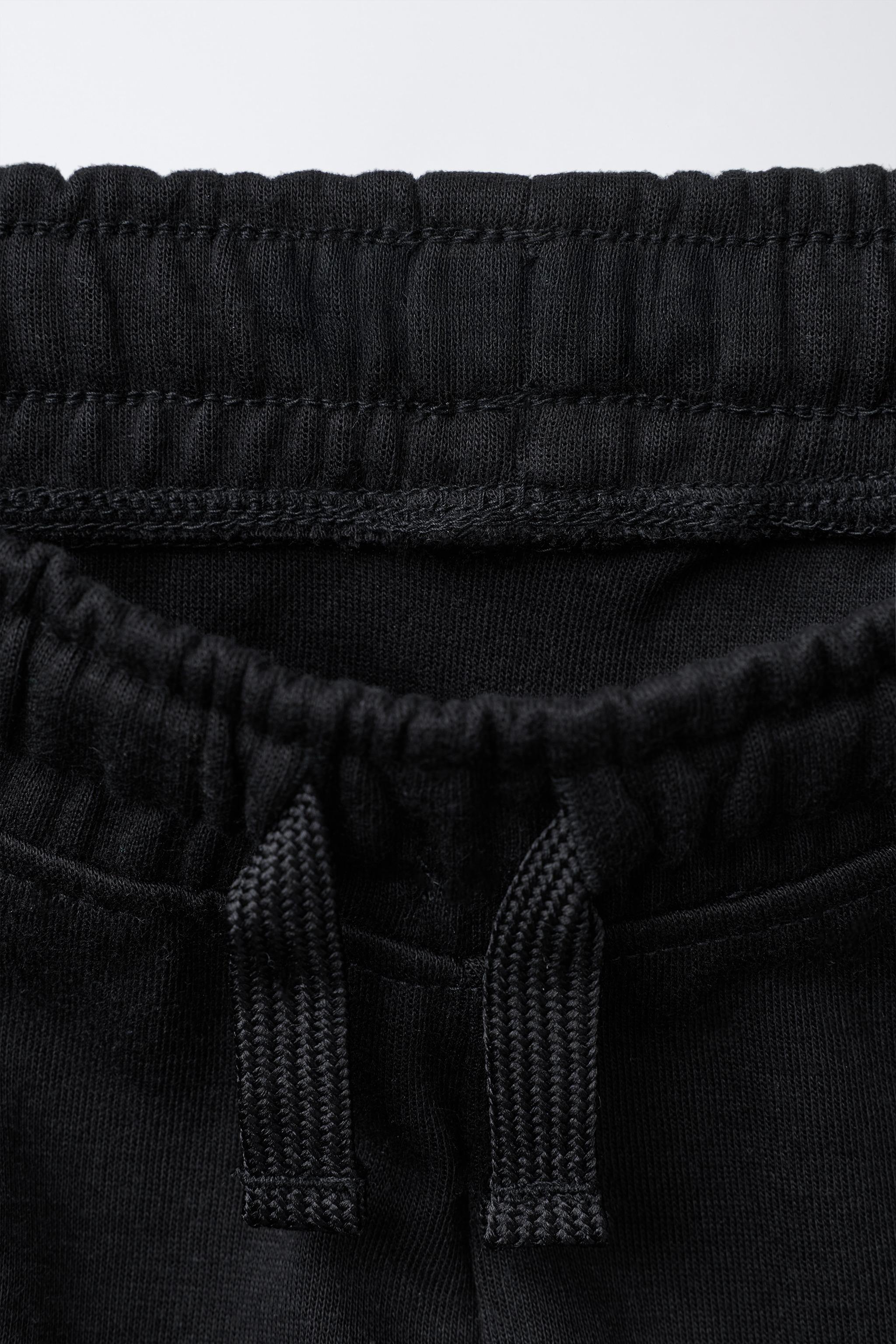 PANTALON DE JOGGING EN PIQUÉ INTERLOCK